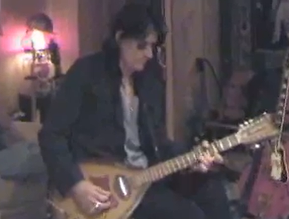Joe Perry playing guitar during the Just Push Play sessions