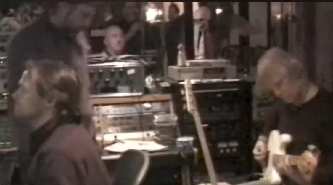 Tom Hamilton playing bass in the control room
